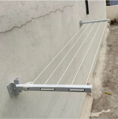 Wall Mounted Foldable Drying Stand. Expand as much as u need With 45 ft Rope. ( Heavy Duty and Rust Free Material)