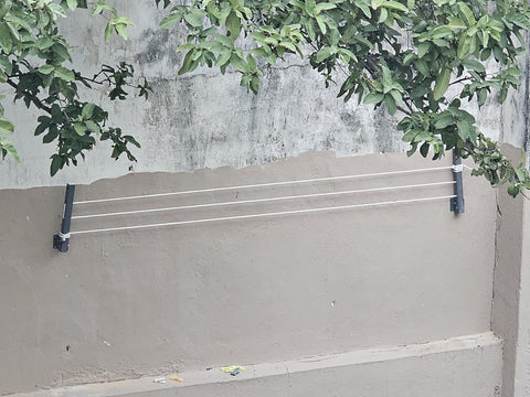 Wall Mounted Foldable Drying Stand. Expand as much as u need With 45 ft Rope. ( Heavy Duty and Rust Free Material)