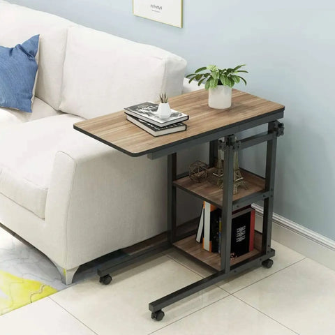 Height adjustable laptop table