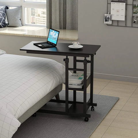 Height adjustable laptop table