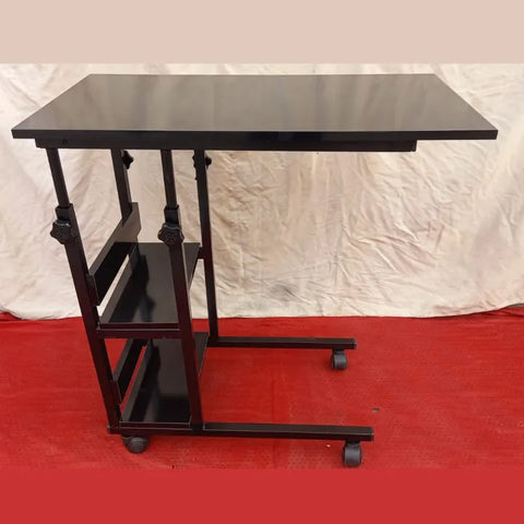 Height adjustable laptop table