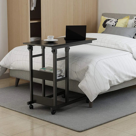 Height adjustable laptop table