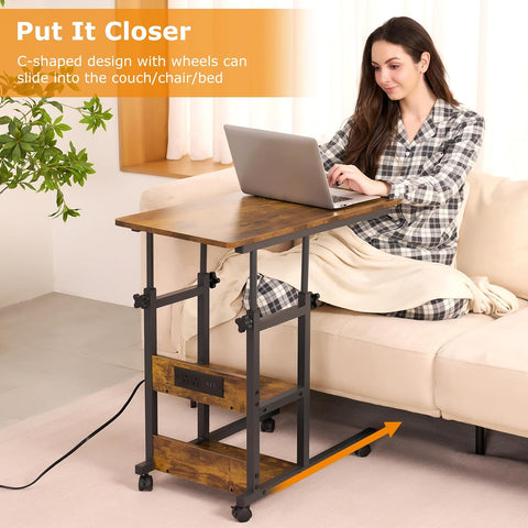 Height adjustable laptop table