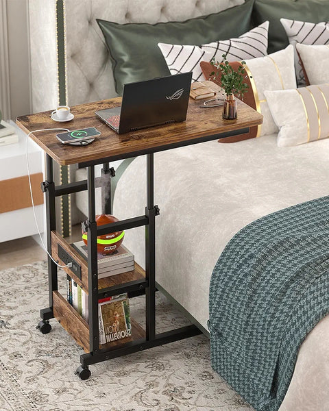 Height adjustable laptop table