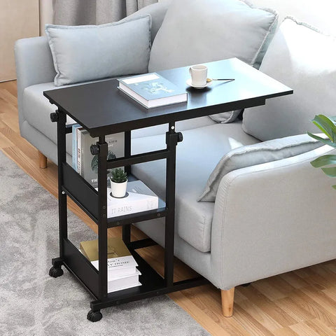 Height adjustable laptop table